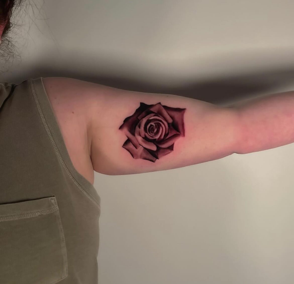 Sacred Mandala Studio tattoo artist - Alessandra Clivio - black and grey rose bicep tattoo.